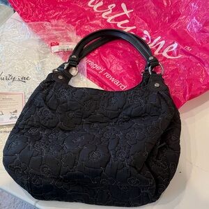 thirty-one Black Quilted poppy retired skirt purse